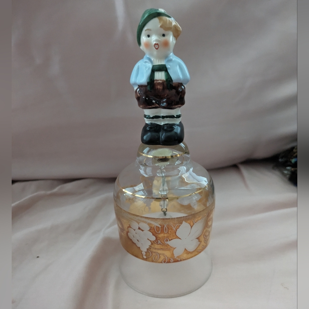 1950's vintage ceramic figurine with crystal bell